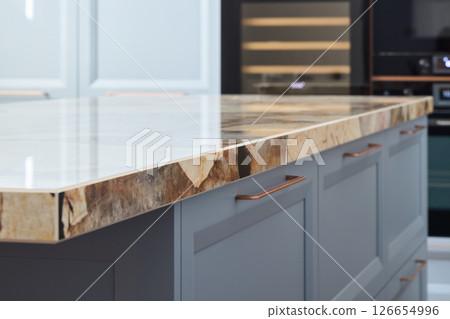 Discover the Modern Kitchen Island featuring a Stylish Stone Countertop that enhances any space 126654996