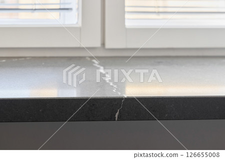 An Elegant Dark Stone Surface that Features Beautiful Natural Veining Patterns Throughout An Elegant Dark Stone Surface that Features Beautiful Natural Veining Patterns Throughout 126655008