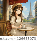 Woman drinking tea in a Parisian cafe 126655073