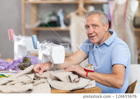 Senior man tailor at work Senior man tailor at work 126655676
