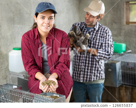 woman and middle aged man working 126655837