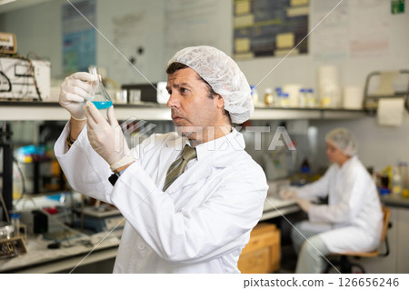 Portrait of an adult male using equipment to work in a laboratory Portrait of an adult male using equipment to work in a laboratory 126656246