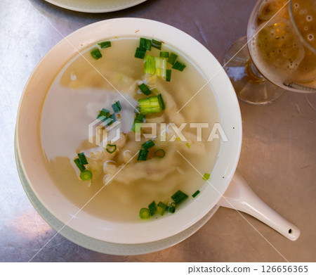 Fish meatball soup with green onions. Chinese cuisine 126656365
