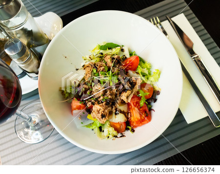 Spanish tuna salad with confit leek and modena 126656374