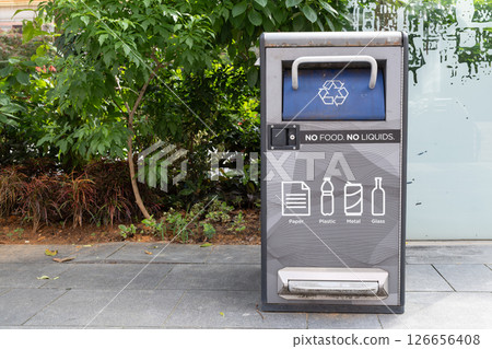 Recycling bin with clear instructions for waste disposal in Orchard Road 126656408