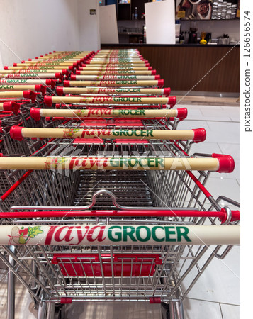 Taya Grocer supermarket shopping carts lined up in Penang, Malaysia Taya Grocer supermarket shopping carts lined up in Penang, Malaysia 126656574