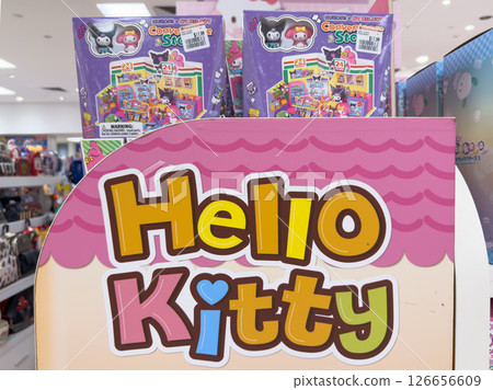 Hello Kitty merchandise display featuring colorful toys and playful branding in a retail store 126656609