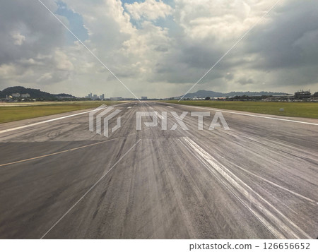 Runway view from flight during takeoff at Penang International Airport 126656652