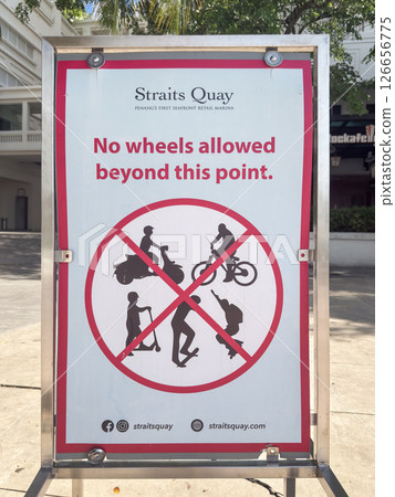 Sign at Straits Quay in Penang emphasizes no wheels policy for pedestrians and safety Sign at Straits Quay in Penang emphasizes no wheels policy for pedestrians and safety 126656775
