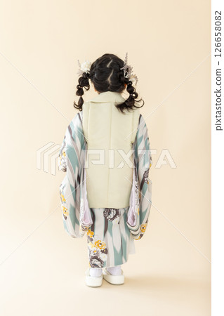 Cute girl in kimono Cute girl in kimono 126658082