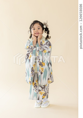 Cute girl in kimono Cute girl in kimono 126658086