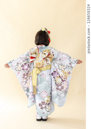 Cute girl in kimono for Shichigosan 7 years old Cute girl in kimono for Shichigosan 7 years old 126658324