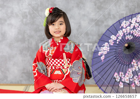 Cute girl in kimono for Shichigosan 7 years old 126658657