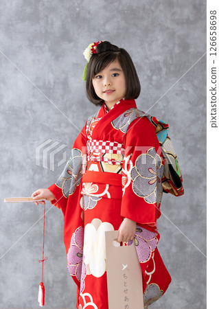 Cute girl in kimono for Shichigosan 7 years old 126658698