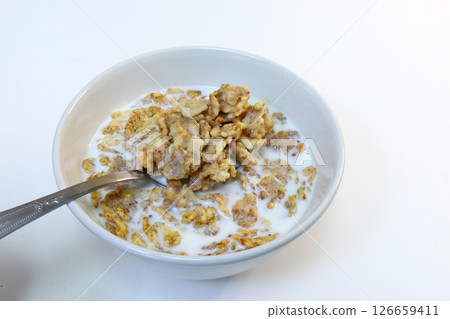 cornflakes in milk, healthy food cornflakes in milk, healthy food 126659411