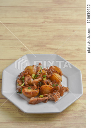 New potato and pork stir fry New potato and pork stir fry 126659622