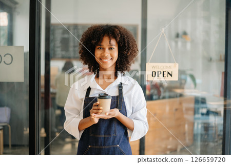 Startup successful small business owner sme woman stand with tablet in cafe restaurant. woman barista cafe owner. Startup successful small business owner sme woman stand with tablet in cafe restaurant. woman barista cafe owner. 126659720