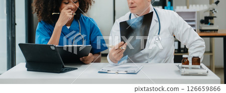 Medical technology network team meeting concept. Doctor hand working with smart phone modern digital tablet and laptop computer 126659866