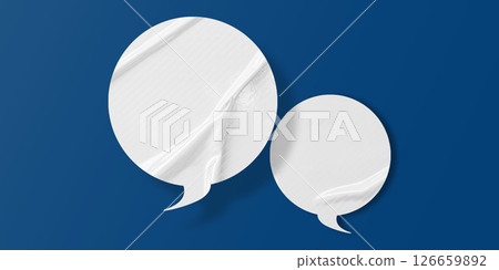White speech bubble crumpled paper isolated on blue background White speech bubble crumpled paper isolated on blue background 126659892