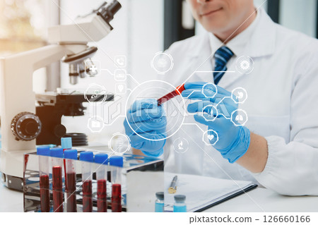 Scientist mixing chemical liquids in the chemistry lab. Researcher working in the chemical laboratory 126660166