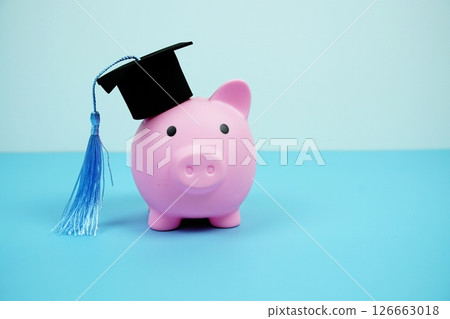 Piggy bank with graduate black cap Education and financial concept 126663018