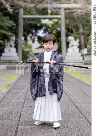 Boy wearing a kimono for Shichigosan, 5 years old Boy wearing a kimono for Shichigosan, 5 years old 126663988