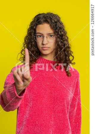 Displeased upset girl reacting to unpleasant awful idea dissatisfied shake head No dislike proposal 126664917