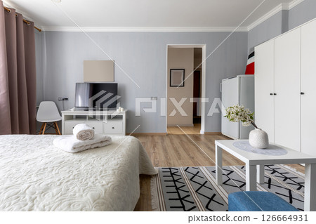 Bright Modern Bedroom-Living Space with Wardrobe Bright Modern Bedroom-Living Space with Wardrobe 126664931