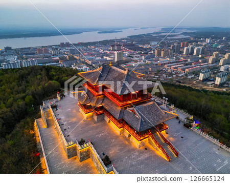 Aerial cityscape of downtown of temple and Fuyuan city is the most eastern point of China, border crossing between China and Russia. 126665124