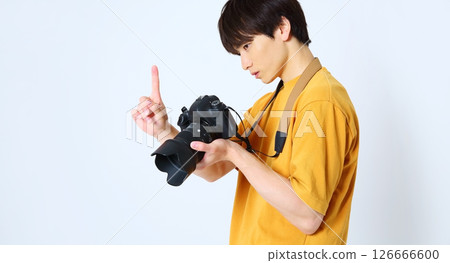 一位男攝影師的形象 126666600