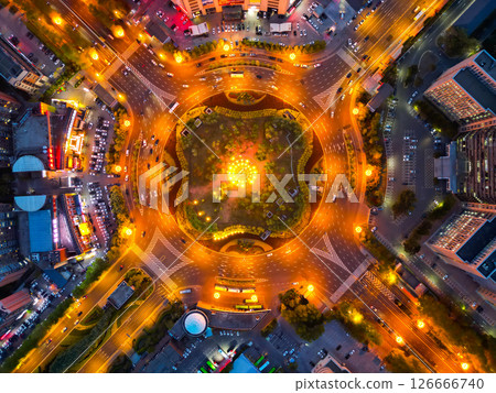 CHANGCHUN, CHINA - MAY 12, 2025-Aerial view of traffic circle in the downtown of Changchun city, Jilin province, China CHANGCHUN, CHINA - MAY 12, 2025-Aerial view of traffic circle in the downtown of Changchun city, Jilin province, China 126666740