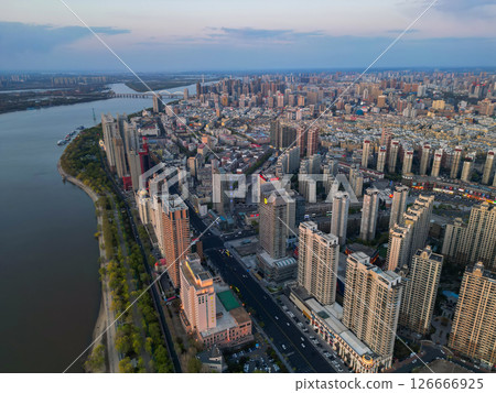 Harbin, CHINA-MAY 05, 2025-Aerial cityscape of Harbin's downtown, is the capital of Heilongjiang, China. It is the largest city of Heilongjiang Harbin, CHINA-MAY 05, 2025-Aerial cityscape of Harbin's downtown, is the capital of Heilongjiang, China. It is the largest city of Heilongjiang 126666925