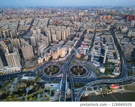 Harbin, CHINA-MAY 05, 2025-Aerial cityscape of Harbin's downtown, is the capital of Heilongjiang, China. It is the largest city of Heilongjiang 126666926