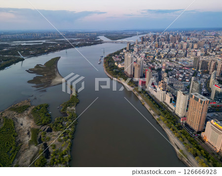 Harbin, CHINA-MAY 05, 2025-Aerial cityscape of Harbin's downtown, is the capital of Heilongjiang, China. It is the largest city of Heilongjiang 126666928