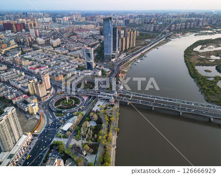 Harbin, CHINA-MAY 05, 2025-Aerial cityscape of Harbin's downtown, is the capital of Heilongjiang, China. It is the largest city of Heilongjiang 126666929