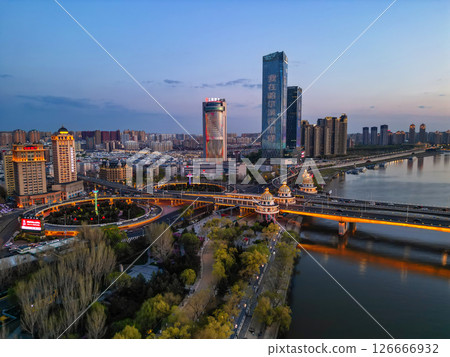 Harbin, CHINA-MAY 05, 2025-Aerial cityscape of Harbin's downtown, is the capital of Heilongjiang, China. It is the largest city of Heilongjiang 126666932
