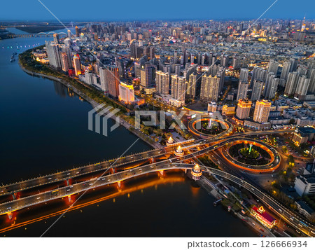 Harbin, CHINA-MAY 05, 2025-Aerial cityscape of Harbin's downtown, is the capital of Heilongjiang, China. It is the largest city of Heilongjiang 126666934