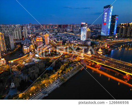 Harbin, CHINA-MAY 05, 2025-Aerial cityscape of Harbin's downtown, is the capital of Heilongjiang, China. It is the largest city of Heilongjiang 126666936