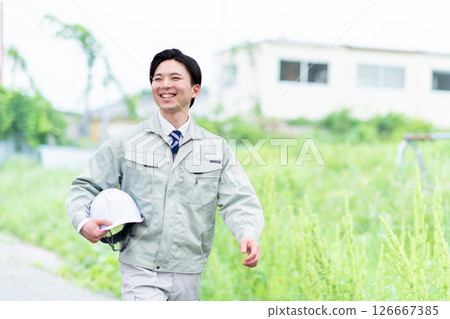 Walking worker Walking worker 126667385