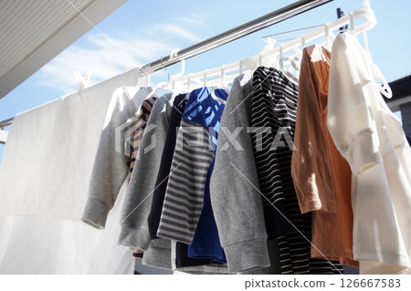 Laundry hung out on the balcony/hanging out to dry Laundry hung out on the balcony/hanging out to dry 126667583