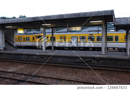 Early morning local train station 126667833