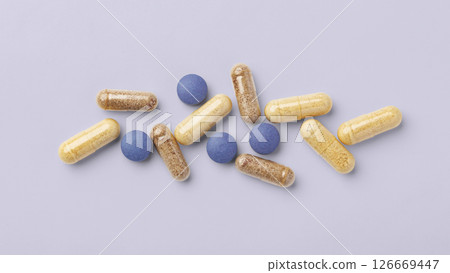 Supplement tablet, beauty vitamin capsule on pastel purple background 126669447