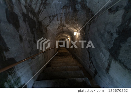 Underground bunker in Kanoya City, Kagoshima Prefecture. The first telegraph room of the underground bunker at the former Kushira Air Base of the Naval Air Corps. Underground bunker in Kanoya City, Kagoshima Prefecture. The first telegraph room of the underground bunker at the former Kushira Air Base of the Naval Air Corps. 126670262