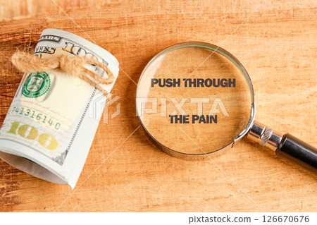 Despite discomfort concept. Words PUSH THROUGH THE PAIN 126670676