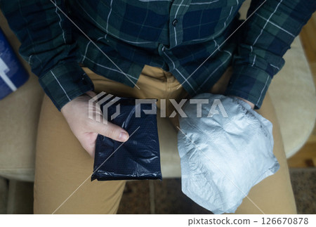 Incontinence pads for men. Urinary incontinence. Sanitary pads for men with problems of the genitourinary system. Urine leakage due to prostatitis or stress. Incontinence pads for men. Urinary incontinence. Sanitary pads for men with problems of the genitourinary system. Urine leakage due to prostatitis or stress. 126670878