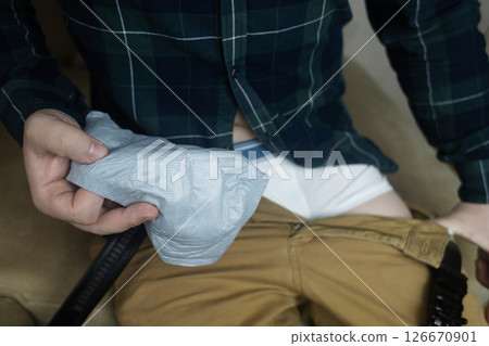 Incontinence pads for men. Urinary incontinence. Sanitary pads for men with problems of the genitourinary system. Urine leakage due to prostatitis or stress. Incontinence pads for men. Urinary incontinence. Sanitary pads for men with problems of the genitourinary system. Urine leakage due to prostatitis or stress. 126670901