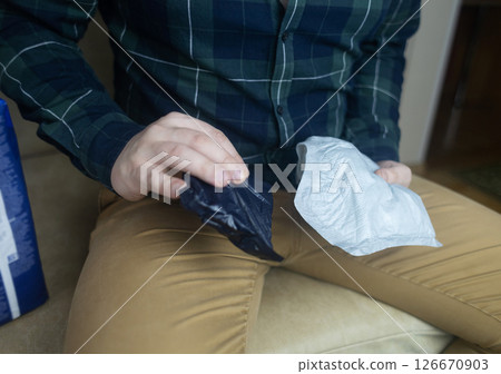 Incontinence pads for men. Urinary incontinence. Sanitary pads for men with problems of the genitourinary system. Urine leakage due to prostatitis or stress.  126670903