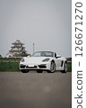 Castle and Porsche 718 Boxster sports car open-top 126671270