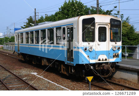 A train stopped at a rural station in Shikoku A train stopped at a rural station in Shikoku 126671289