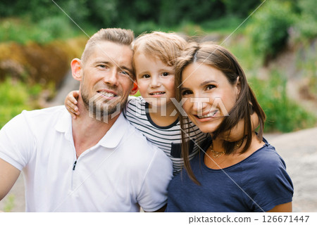 Family Sharing Happy Moment In Summer Forest Outdoors Family Sharing Happy Moment In Summer Forest Outdoors 126671447